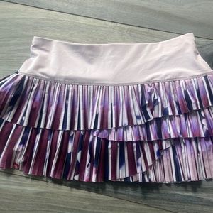 Lucky In Love tennis skirt.  purples and pleated size Med